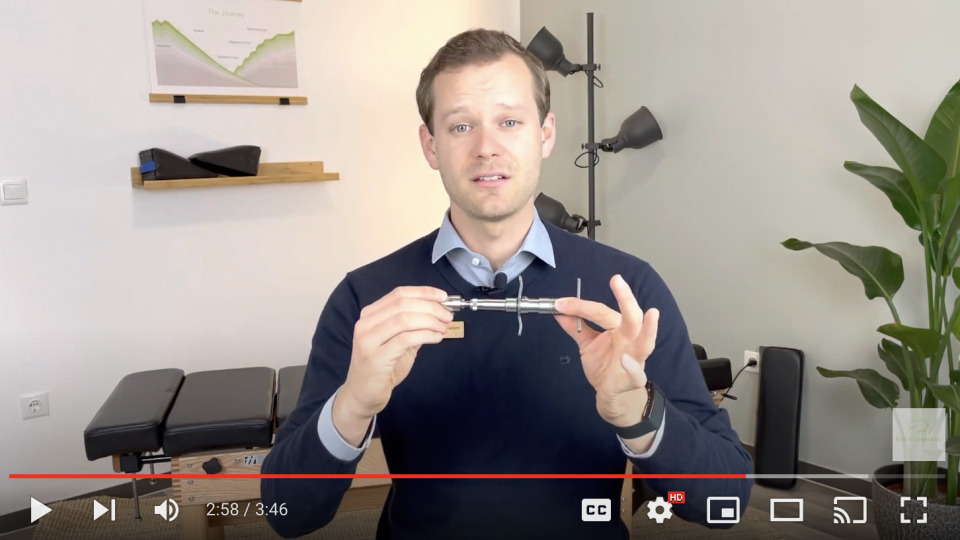 Screenshot from video showing a Chiropractic Activator Adjustment Tool